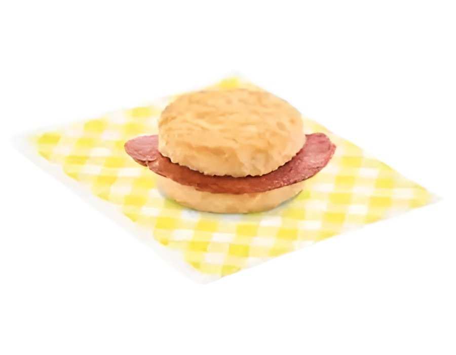 Bojangles Country Ham Biscuit sandwich on a plate