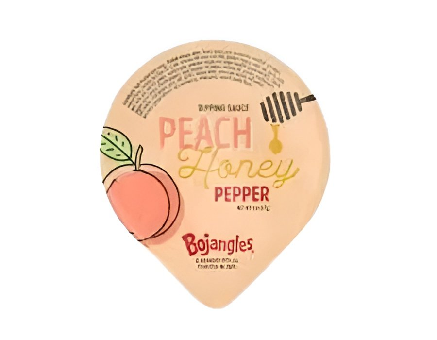 Peach Honey Pepper flavored sauce or seasoning bottle