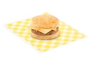 Bojangles sausage egg and cheese biscuit with melted cheese, folded egg, and sausage on a warm golden biscuit.